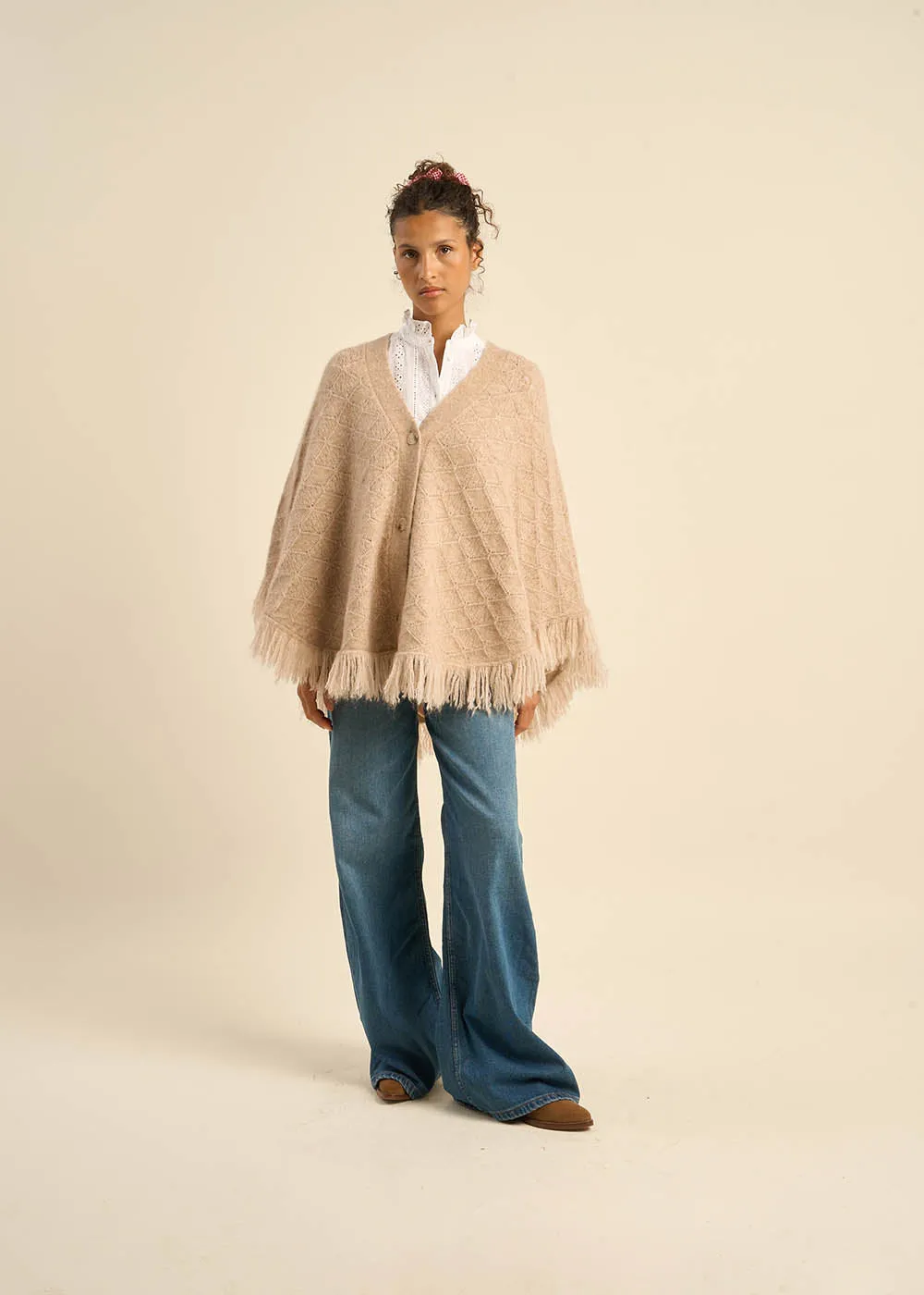 Poncho boutonné à franges