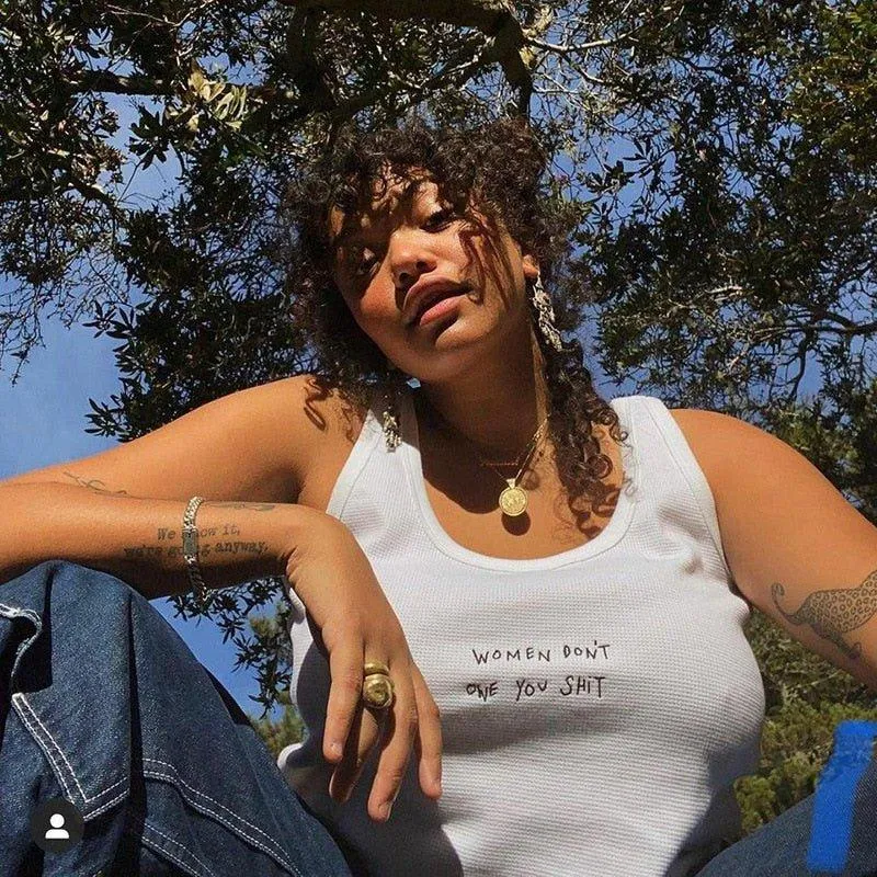 "Women don't owe you shit" Tank Top